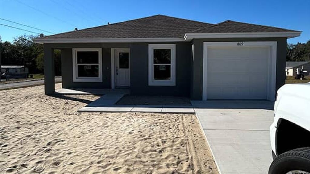 New Home with truck in driveway